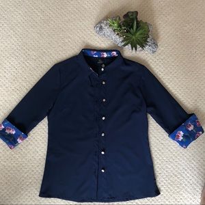 Blue blouse with accented collar and sleeves